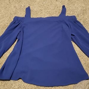 Off the shoulder shirt.